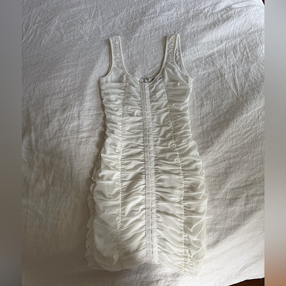 Shiner white ruched dress. Perfect for a bride or bachelorette